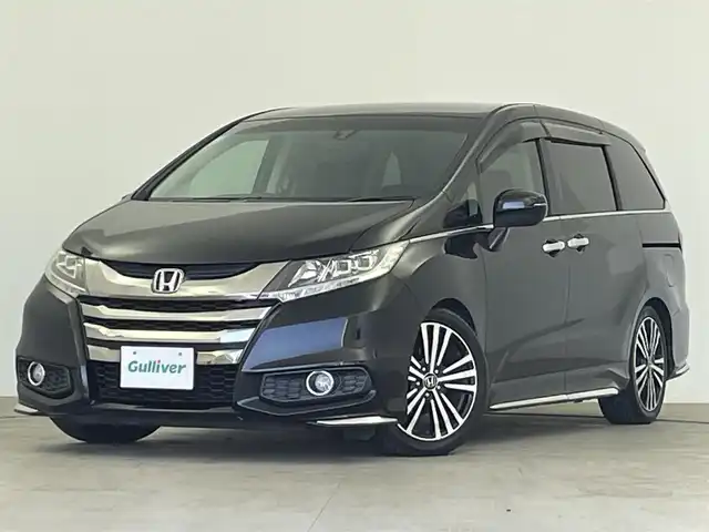 ホンダ オデッセイ アブソルート 大分県 2014(平26)年 9.5万km 黒 純正ディーラーナビ/・フルセグTV/・Bluetooth/・CD/・DVD/バックカメラ/両側パワースライドドア/ビルトインETC/フリップダウンモニター/クルーズコントロール/純正16インチアルミホイール/フォグライト/ステアリングリモコン/ハーフレザーシート/パドルシフト/LEDヘッドライト/プッシュスタート/スマートキー/電動格納ミラー/パワーウィンドウ/パワーステアリング