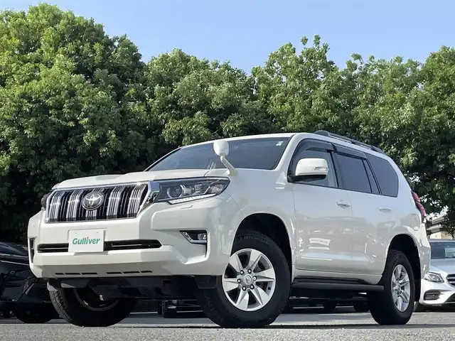 トヨタ ランドクルーザー プラド TX 東京都 2020(令2)年 2.2万km ホワイトパールクリスタルシャイン ワンオーナー/サンルーフ/ブラックルーフレール/純正メモリナビ（NSZT-Y68T）/バックカメラ/・フルセグTV/Bluetoothオーディオ/DVD/純正ドライブレコーダー（DRT-H68A）/Toyota Safety Sense/・プリクラッシュセーフティ/・レーンディパーチャーアラート/・オートマチックハイビーム/・レーダークルーズコントロール（ブレーキ制御付）/純正アルミホイール/純正フロアマット/保証書/取扱説明書/スペアキー