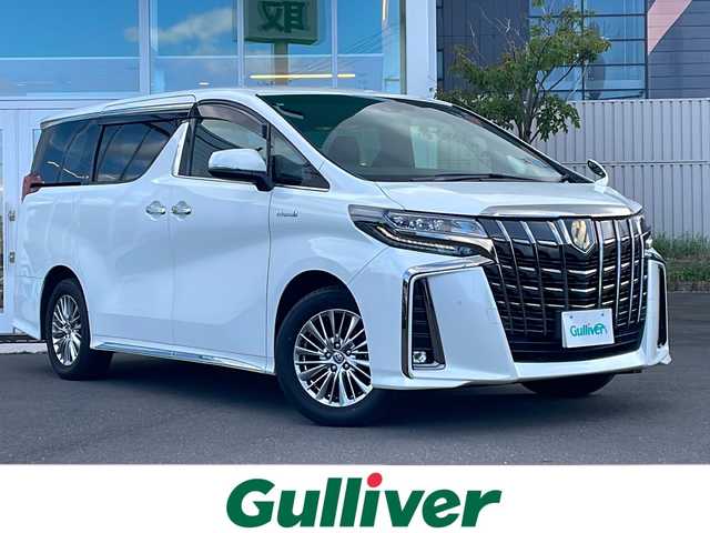 トヨタ アルファードハイブリット S タイプゴールド 道央・札幌 2021(令3)年 9.6万km ホワイトパールクリスタルシャイン ・4WD/・衝突軽減ブレーキ/・寒冷地仕様/・両側パワースライドドア/・純正ナビ/CD&DVD&BT&フルセグTV&AppleCarPlay/・キャンセラー/・ハンズフリー/・フリップダウンモニター(リモコン付)/・バックカメラ/・コーナーセンサー/・レーンキープアシスト/・レーダークルーズコントロール(追従走行あり)/・横滑り防止装置/・WAC/・前席バニティミラー(両側ライト付)/・ウォークスルー/・2列目両側オットマン/・USB入力端子/・1列目2列目100V充電/・プッシュスタート/・スマートキー/・ワイパー熱線/・前方純正ドライブレコーダー/・ビルトインETC/・オートライト/・オートマチックハイビーム/・前後コーナーセンサー/・電動格納ミラー/・ウィンカーミラー/・フォグランプ/・純正フロアマット/・ドアバイザー/・積込17インチ冬タイヤ