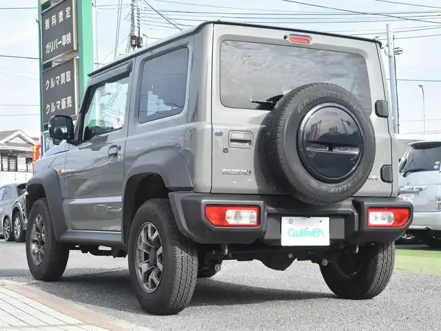 スズキ ジムニー シエラ JC 神奈川県 2024(令6)年 2.1万km ミディアムグレー 社外メモリナビ/フルセグテレビ/バックカメラ/クルーズコントロール/社外ミラー型ドライブレコーダー/ETC/シートカバー/シートヒーター/ETC/LEDヘッドライト/プッシュスタート/スマートキー/保証書/取説/記録(R.6.7)/スペアスマートキー