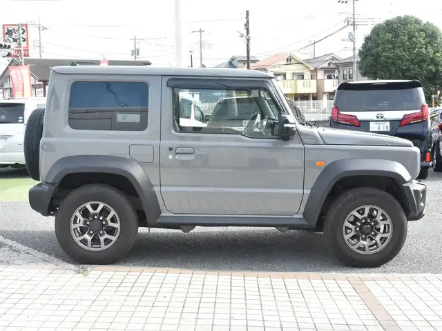 スズキ ジムニー シエラ JC 神奈川県 2024(令6)年 2.1万km ミディアムグレー 社外メモリナビ/フルセグテレビ/バックカメラ/クルーズコントロール/社外ミラー型ドライブレコーダー/ETC/シートカバー/シートヒーター/ETC/LEDヘッドライト/プッシュスタート/スマートキー/保証書/取説/記録(R.6.7)/スペアスマートキー