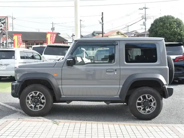 スズキ ジムニー シエラ JC 神奈川県 2024(令6)年 2.1万km ミディアムグレー 社外メモリナビ/フルセグテレビ/バックカメラ/クルーズコントロール/社外ミラー型ドライブレコーダー/ETC/シートカバー/シートヒーター/ETC/LEDヘッドライト/プッシュスタート/スマートキー/保証書/取説/記録(R.6.7)/スペアスマートキー