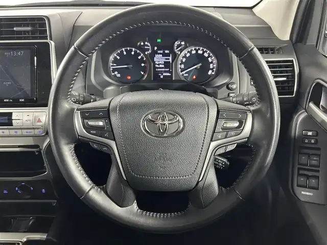 トヨタ ランドクルーザー プラド TX Lパッケージ 佐賀県 2023(令5)年 3万km ブラック 純正9インチナビ/フルセグTV/CD/DVD/Bluetooth/バックカメラ/サンルーフ/モデリスタエアロ/運転席・助手席サイドステップ/衝突被害軽減システム/レーダークルーズコントロール/レーンアシスト/ロードサインアシスト/先行車発進お知らせ機能/オートライト/オートマチックハイビーム/LEDヘッドライト/LEDフォグライト/クリアランスソナー/ビルトインETC/運転席・助手席シートヒーター/運転席・助手席エアシート/運転席・助手席パワーシート/レザーシート/ISOFIX対応/純正19インチアルミホイール/ルーフレール/４WD/純正フロアマット/スマートキー/スペアキー×１