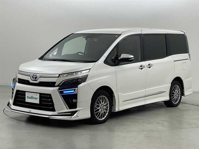 トヨタ ヴォクシー ハイブリッド ZS 煌Ⅲ 福岡県 2020(令2)年 4.8万km ホワイトパールクリスタルシャイン モデリスタフルエアロ　/後席モニター　/純正ナビ　/Ｂカメラ　/前後ドラレコ　/ＥＴＣ　/クルーズコントロール　/障害物センサー　/衝突被害軽減　/ＬＤＡ　/ＰＫＳＢ　/両側電動スライドドア　/ハーフレザー　/シートヒーター