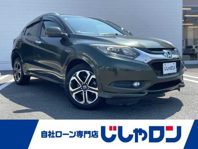 ホンダ ヴェゼル ハイブリッド Z 熊本県 2015(平27)年 10.3万km ミスティックグリーンパール (株)IDOMが運営する【じしゃロン熊本店】の自社ローン専用車両になります。こちらは現金またはオートローンご利用時の価格です。自社ローンご希望の方は別途その旨お申付け下さい/純正ナビ　/バックカメラ　/ビルトインＥＴＣ　/クルーズコントロール　/シートヒーター　/アイドリングストップ　/Ｗ＋サイドエアバッグ　/カーテンエアバッグ　/あんしんパッケージ　/プッシュスタート　/スマートキー