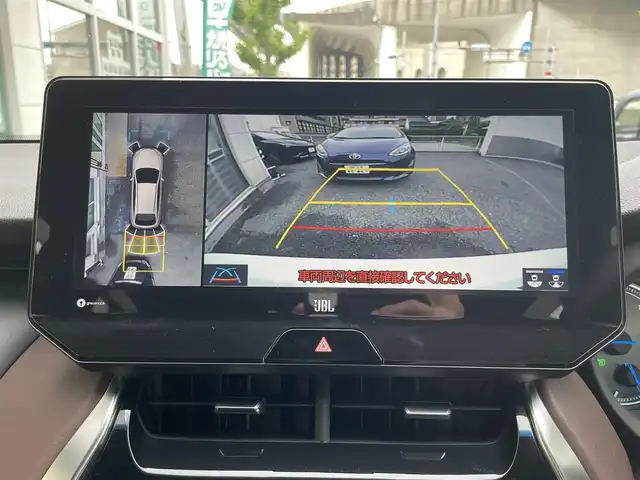トヨタ ハリアー ハイブリッド Z レザーパッケージ 東京都 2020(令2)年 2.4万km ホワイトパールクリスタルシャイン 純正12.3型ナビ/　フルセグTV/Bluetooth/パノラミックビューモニター/衝突被害軽減/レーンキープ/レーダークルーズコントロール/オートマチックハイビーム/クリアランスソナー/デジタルインナーミラー/ヘッドアップディスプレイ/JBLサウンド/ブラインドスポットモニター/ビルトインETC2.0/レザーシート/パワーシート/シートヒーター/ベンチレーション/パワーバックドア/純正19インチアルミホイール/LEDヘッドライト/フォグランプ/オートライト/ハンドルヒーター/ステアリングスイッチ/プッシュスタート/スマートキー/電動格納ミラー/ウインカーミラー/横すべり防止/フロアマット/ドアバイザー/取扱説明書