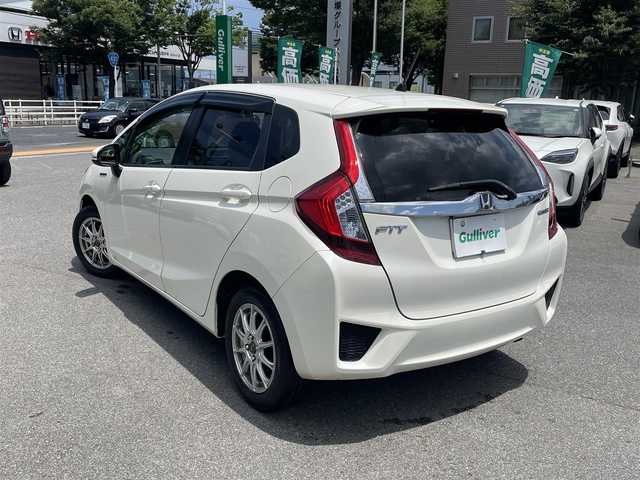 ホンダ フィット ハイブリット Lパッケージ 鳥取県 2013(平25)年 14.1万km プレミアムホワイトパール HONDAインターナビ/・フルセグ/・Bluetooth/・HDMI/バックカメラ/スマートキー/プッシュスタート/ビルトインETC/クルーズコントロール/タッチパネルAAC/ハーフレザーシート/社外15AW/オートライト/LEDヘッドライト/ABS/Wエアバック/サイドエアバック /カーテンエアバック