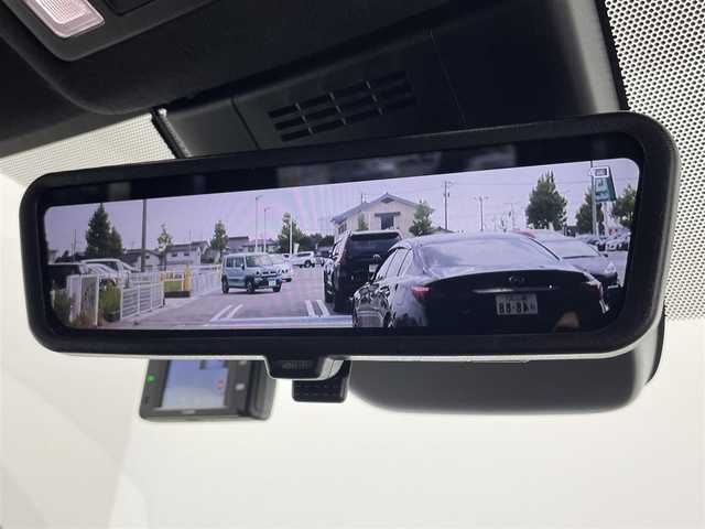 トヨタ ヴォクシー ハイブリッド S－Z 富山県 2023(令5)年 3.1万km アティチュードブラックマイカ 純正10.5ディスプレイオーディオ/DVDキット/フルセグTV/全方位カメラ/ETC2.0/デジタルインナーミラー/HUD/BSM/3眼LEDヘッドライト/パワーバックドア /シートヒーター/冬タイヤセット4本車載/パーキングアシスト/AC100V/前後ドラレコ /レーダークルーズ/ステアリングヒーター