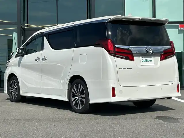 トヨタ アルファード S Cパッケージ 愛媛県 2021(令3)年 3.1万km ホワイトパールクリスタルシャイン Wサンルーフ/純正9型ナビ(AM/FM/CD/DVD/BT/フルセグTV)/純正12型フリップダウンモニター/両側電動パワースライドドア/バックカメラ/黒革シート/前席パワーシート/シートヒーター/シートベンチレーション/シートメモリー機能/トヨタセーフティセンス/レーダークルーズコントロール/衝突被害軽減装置/車線逸脱防止装置/クリアランスソナー/ステアリングヒーター/電動リアゲート/ETC/3眼LEDヘッドライト/電動パーキングブレーキ/Autohold機能/ステアリングリモコン/現状サマー(純正AW)(235/50/R18)/TOYOTIRES TRANPATH MP7