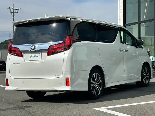 トヨタ アルファード S Cパッケージ 愛媛県 2021(令3)年 3.1万km ホワイトパールクリスタルシャイン Wサンルーフ/純正9型ナビ(AM/FM/CD/DVD/BT/フルセグTV)/純正12型フリップダウンモニター/両側電動パワースライドドア/バックカメラ/黒革シート/前席パワーシート/シートヒーター/シートベンチレーション/シートメモリー機能/トヨタセーフティセンス/レーダークルーズコントロール/衝突被害軽減装置/車線逸脱防止装置/クリアランスソナー/ステアリングヒーター/電動リアゲート/ETC/3眼LEDヘッドライト/電動パーキングブレーキ/Autohold機能/ステアリングリモコン/現状サマー(純正AW)(235/50/R18)/TOYOTIRES TRANPATH MP7