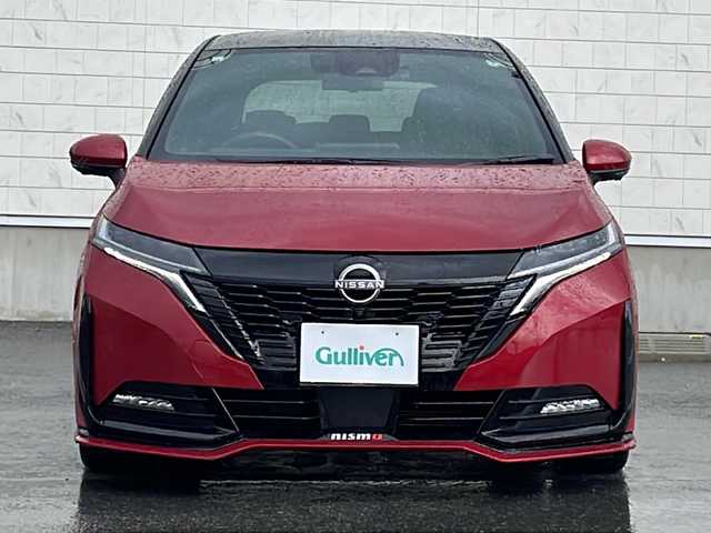 日産 オーラ ニスモ 山形県 2021(令3)年 1.8万km ガーネットレッド/スーパーブラック 2トーン 禁煙車/360°セーフティアシスト（全方位運転支援システム）/・プロパイロット/・エマージェンシーブレーキ/・標識検知機能/・車線逸脱警報（LDW）/・側方車両検知警報（BSW）/・後退時車両検知警報（RCTA）/・ふらつき警報（DA）/アラウンドビューモニター/インテリジェントパーキングアシスト（IPA）/フルエアロ/純正ナビ/（フルセグ/BT/HDMI/USB）/インテリジェントルームミラー/置くだけ充電/ビルトインETC/LEDヘッドライト/電動パーキングブレーキ/オートホールド/17インチ純正AW/純正フロアマット/スマートキー/プッシュスタート