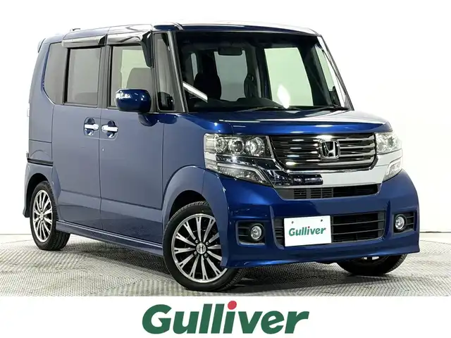 ホンダ Ｎ ＢＯＸ カスタム ターボ SSパッケージ 大阪府 2014(平26)年 2.1万km プレミアムダイナミックブルーパール 純正ナビTV バックカメラ 両側パワースライドドア シートヒーター クルーズコントロール 衝突軽減ブレーキ スマートキー プッシュスタート アイドリングストップ オートライト HIDヘッドライト ETC