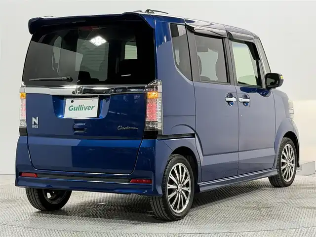 ホンダ Ｎ ＢＯＸ カスタム ターボ SSパッケージ 大阪府 2014(平26)年 2.1万km プレミアムダイナミックブルーパール 純正ナビTV バックカメラ 両側パワースライドドア シートヒーター クルーズコントロール 衝突軽減ブレーキ スマートキー プッシュスタート アイドリングストップ オートライト HIDヘッドライト ETC
