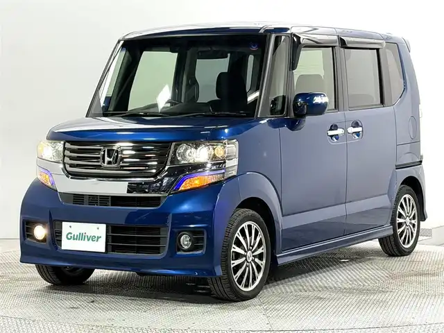ホンダ Ｎ ＢＯＸ カスタム ターボ SSパッケージ 大阪府 2014(平26)年 2.1万km プレミアムダイナミックブルーパール 純正ナビTV バックカメラ 両側パワースライドドア シートヒーター クルーズコントロール 衝突軽減ブレーキ スマートキー プッシュスタート アイドリングストップ オートライト HIDヘッドライト ETC