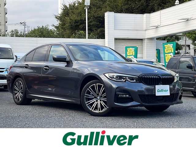 ＢＭＷ ３３０ｅ 東京都 2020(令2)年 2万km ミネラルグレー ワンオーナー/新車時保証書　整備記録簿　取扱説明書/インテリジェントセーフティー/アダプティブクルーズコントロール/アイドリングストップ/純正HDDナビ/USB/BT/ScreenMirroring/360度カメラ　ルームミラー内臓ETC/フロントパワーシート【運転席メモリー付】/ハーフレザーシート/シートヒーター/LEDヘッドライト/オートライト/パワーバックドア/スマートキー×２/デジタルカードキー×１/パドルシフト付革巻きハンドル/コーナーセンサー/純正18インチアルミ