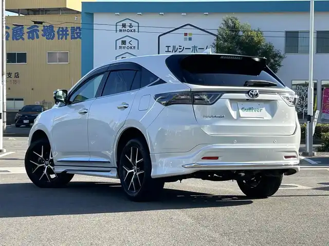 トヨタ ハリアー プレミアム スタイルアッシュ 愛媛県 2016(平28)年 8.4万km ホワイトパールクリスタルシャイン ディーラーオプション純正ナビ/BT/AM・FM/CD/DVD/フルセグTV/ETC/前方ドライブレコーダー/バックカメラ/クルーズコントロール/レーンキープアシスト/衝突軽減システム/横滑り防止装置/ステアリングスイッチ/D+N席パワーシート・シートヒーター/モデリスタエアロパーツ/アルパインツイータ－/純正フロアマット/純正アルミホイール