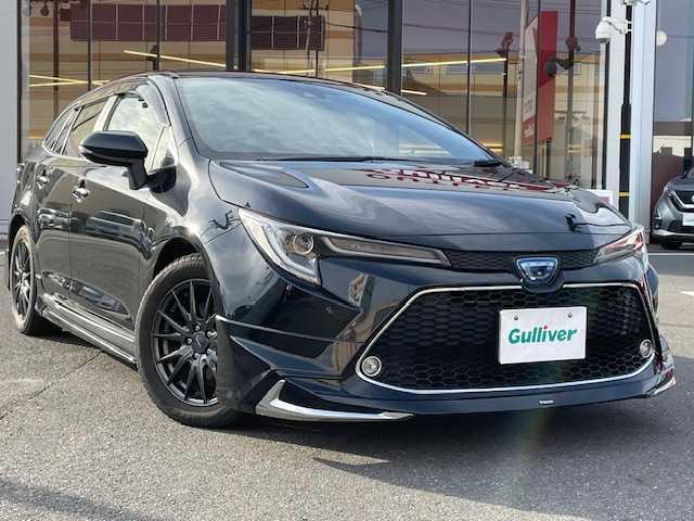 トヨタ カローラツーリング ハイブリッド ダブルバイビー 宮城県 2021(令3)年 12.6万km ブラックマイカ 登録時走行距離125874km/純正ナビ/TV・Bluetooth・AM・FM・ミラキャスト/バックカメラ/シートヒーター/モデリスタエアロ/寒冷地仕様/純正ビルトインETC/コーナーセンサー/電動パーキングシステム/オートマチックハイビーム/ステアリングヒーター/レーザー探知機/プッシュスタート/ドアバイザー/電動格納ミラー