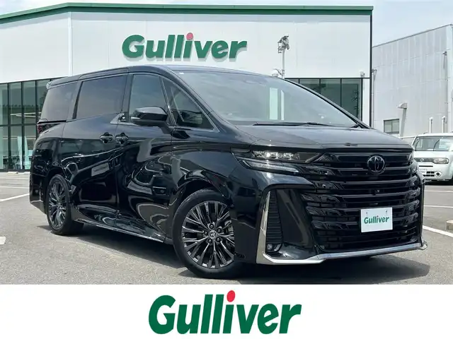 トヨタ ヴェルファイア ハイブリット Z プレミア 愛媛県 2023(令5)年 5.4万km ブラック 登録時走行距離：53925Km/メーカーオプション純正14インチHDナビ/AM/FM/フルセグTV/Bluetooth/ヘッドアップディスプレイ/ムーンルーフ/バックサイドカメラ/ワイヤレス充電/前後ドライブレコーダー/横滑り防止装置/パーキングアシスト/LEDヘッドライト/オートライト/オートハイビーム/フォグランプ/エンジンスタートボタン/シートヒーター/スマートキー/純正アルミホイール/純正フロアマット/シートーヒーター/シートメモリ
