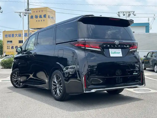トヨタ ヴェルファイア ハイブリット Z プレミア 愛媛県 2023(令5)年 5.4万km ブラック 登録時走行距離：53925Km/メーカーオプション純正14インチHDナビ/AM/FM/フルセグTV/Bluetooth/ヘッドアップディスプレイ/ムーンルーフ/バックサイドカメラ/ワイヤレス充電/前後ドライブレコーダー/横滑り防止装置/パーキングアシスト/LEDヘッドライト/オートライト/オートハイビーム/フォグランプ/エンジンスタートボタン/シートヒーター/スマートキー/純正アルミホイール/純正フロアマット/シートーヒーター/シートメモリ