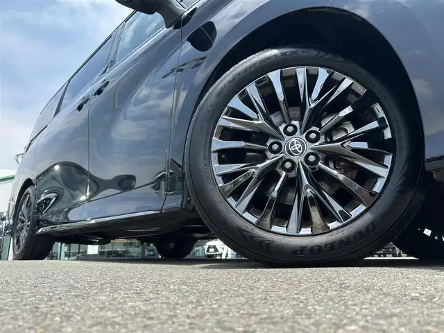 トヨタ ヴェルファイア ハイブリット Z プレミア 愛媛県 2023(令5)年 5.4万km ブラック 登録時走行距離：53925Km/メーカーオプション純正14インチHDナビ/AM/FM/フルセグTV/Bluetooth/ヘッドアップディスプレイ/ムーンルーフ/バックサイドカメラ/ワイヤレス充電/前後ドライブレコーダー/横滑り防止装置/パーキングアシスト/LEDヘッドライト/オートライト/オートハイビーム/フォグランプ/エンジンスタートボタン/シートヒーター/スマートキー/純正アルミホイール/純正フロアマット/シートーヒーター/シートメモリ