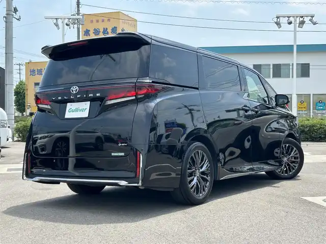 トヨタ ヴェルファイア ハイブリット Z プレミア 愛媛県 2023(令5)年 5.4万km ブラック 登録時走行距離：53925Km/メーカーオプション純正14インチHDナビ/AM/FM/フルセグTV/Bluetooth/ヘッドアップディスプレイ/ムーンルーフ/バックサイドカメラ/ワイヤレス充電/前後ドライブレコーダー/横滑り防止装置/パーキングアシスト/LEDヘッドライト/オートライト/オートハイビーム/フォグランプ/エンジンスタートボタン/シートヒーター/スマートキー/純正アルミホイール/純正フロアマット/シートーヒーター/シートメモリ