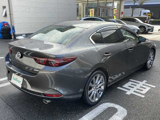 マツダ マツダ３セダン XD Lパッケージ 広島県 2019(令1)年 3.9万km マシーングレープレミアムM /登録時走行距離/　　　　　　　38317キロ/ワンオーナー/i-stop/純正ナビ/全方位モニター/地デジ/黒革シート/シートヒーター/ステアヒーター/クルーズコントロール/HUD/スペアキー×１/ビルトインETC/新車時整備手帳/　　【保証書】/取扱説明書/