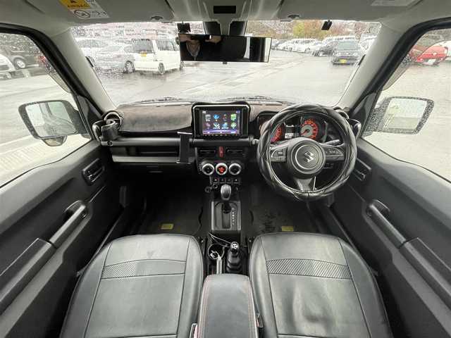 スズキ ジムニー シエラ JC 香川県 2020(令2)年 6.9万km ブルーイッシュブラックパール3 Panasonicナビ　/バックカメラ　/ルーフキャリア　/純正マッドガード　/ドライブレコーダー　/クルーズコントロール　/衝突被害軽減システム　/車線逸脱防止装置　/D/N席シートヒーター　/ダウンヒルアシストコントロール/ETC/電格ミラー/ヒートミラー/後付けスマホ置き/センターコンソール/ヘッドライトウォッシャー/純正レザー調シートカバー/ISOFIX/シガーソケット/純正ドアバイザー/現状ランフラットタイヤ(純正AW)(LT215/75/R15)/YOKOHAMA GEOLANDAR M/T G003