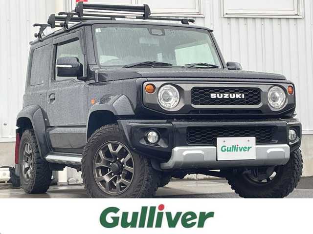 スズキ ジムニー シエラ JC 香川県 2020(令2)年 6.9万km ブルーイッシュブラックパール3 Panasonicナビ　/バックカメラ　/ルーフキャリア　/純正マッドガード　/ドライブレコーダー　/クルーズコントロール　/衝突被害軽減システム　/車線逸脱防止装置　/D/N席シートヒーター　/ダウンヒルアシストコントロール/ETC/電格ミラー/ヒートミラー/後付けスマホ置き/センターコンソール/ヘッドライトウォッシャー/純正レザー調シートカバー/ISOFIX/シガーソケット/純正ドアバイザー/現状ランフラットタイヤ(純正AW)(LT215/75/R15)/YOKOHAMA GEOLANDAR M/T G003