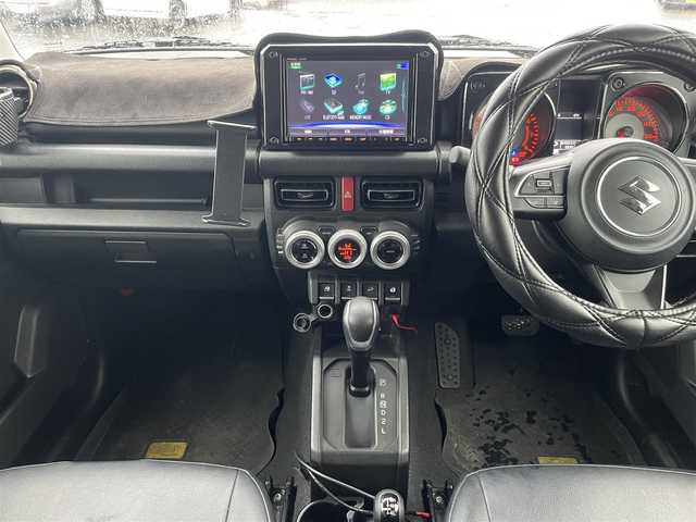 スズキ ジムニー シエラ JC 香川県 2020(令2)年 6.9万km ブルーイッシュブラックパール3 Panasonicナビ　/バックカメラ　/ルーフキャリア　/純正マッドガード　/ドライブレコーダー　/クルーズコントロール　/衝突被害軽減システム　/車線逸脱防止装置　/D/N席シートヒーター　/ダウンヒルアシストコントロール/ETC/電格ミラー/ヒートミラー/後付けスマホ置き/センターコンソール/ヘッドライトウォッシャー/純正レザー調シートカバー/ISOFIX/シガーソケット/純正ドアバイザー/現状ランフラットタイヤ(純正AW)(LT215/75/R15)/YOKOHAMA GEOLANDAR M/T G003