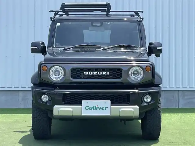 スズキ ジムニー シエラ JC 香川県 2020(令2)年 6.9万km ブルーイッシュブラックパール3 登録時走行距離：68303km/パナソニック製8型ナビ/　CD DVD BT フルセグTV/バックカメラ/ビルトインETC/ドライブレコーダー/衝突被害軽減装置/レーンキープアシスト/クルーズコントロール/ダウンヒルアシストコントロール/LEDヘッドライト/オートライト/フォグランプ/ヘッドライトウォッシャー/純正マッドガード/ルーフキャリア/背面タイヤ/電動格納ミラー/ヒーテッドドアミラー/純正革調シートカバー/シートヒーター/プッシュスタート/スマートキー/スペアキー