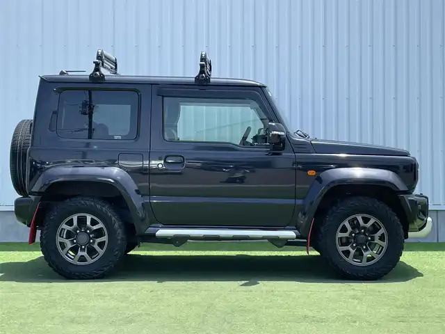 スズキ ジムニー シエラ JC 香川県 2020(令2)年 6.9万km ブルーイッシュブラックパール3 登録時走行距離：68303km/パナソニック製8型ナビ/　CD DVD BT フルセグTV/バックカメラ/ビルトインETC/ドライブレコーダー/衝突被害軽減装置/レーンキープアシスト/クルーズコントロール/ダウンヒルアシストコントロール/LEDヘッドライト/オートライト/フォグランプ/ヘッドライトウォッシャー/純正マッドガード/ルーフキャリア/背面タイヤ/電動格納ミラー/ヒーテッドドアミラー/純正革調シートカバー/シートヒーター/プッシュスタート/スマートキー/スペアキー