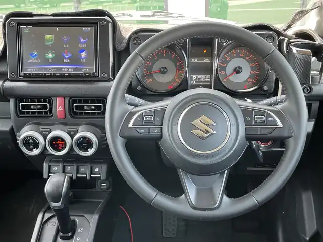 スズキ ジムニー シエラ JC 香川県 2020(令2)年 6.9万km ブルーイッシュブラックパール3 登録時走行距離：68303km/パナソニック製8型ナビ/　CD DVD BT フルセグTV/バックカメラ/ビルトインETC/ドライブレコーダー/衝突被害軽減装置/レーンキープアシスト/クルーズコントロール/ダウンヒルアシストコントロール/LEDヘッドライト/オートライト/フォグランプ/ヘッドライトウォッシャー/純正マッドガード/ルーフキャリア/背面タイヤ/電動格納ミラー/ヒーテッドドアミラー/純正革調シートカバー/シートヒーター/プッシュスタート/スマートキー/スペアキー
