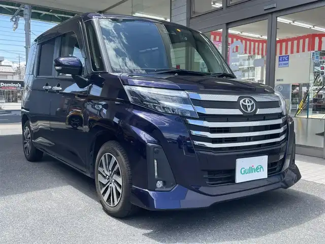 トヨタ ルーミー カスタムG 愛知県 2021(令3)年 2.2万km クールバイオレットクリスタルシャイン 純正9型SDナビ（NSZT-Y68T）/・DVD/Bluetooth／地デジTV/バックカメラ＋全方位カメラ/両側パワースライドドア/スマートアシスト/・衝突回避支援ブレーキ/・誤発進抑制機能/・先行車発進お知らせ/・ACC（アダプティブクルーズコントロール）/前後コーナーセンサー/ETC/コムテック前後ドラレコ（DC-DR652）/電子パーキング/オートブレーキホールド/後席ロールサンシェード/スマートキー＆プッシュスタート/純正14インチAW