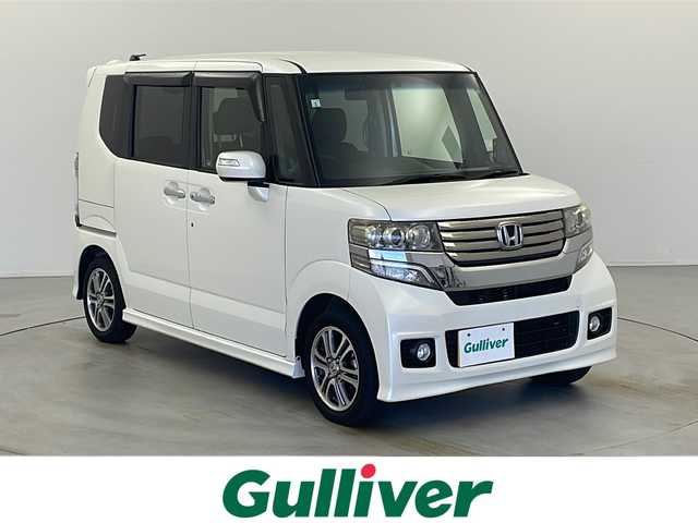 ホンダ Ｎ ＢＯＸ カスタム G Lパッケージ 栃木県 2013(平25)年 16.1万km プレミアムホワイトパール 社外SDナビ/・AM/FM/CD/DVD/フルセグ/SD/BT/iPod/左側電動スライドドア/ETC/HIDヘッドランプ/純正マット/ドアバイザー/社外14インチアルミ付きスタッドレス積み込み/保証書/取扱説明書