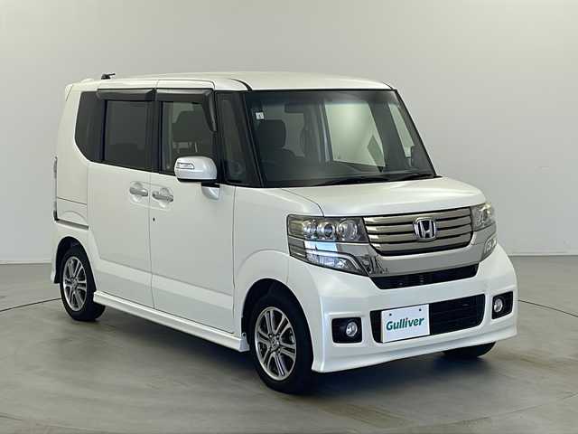 ホンダ Ｎ ＢＯＸ カスタム G Lパッケージ 栃木県 2013(平25)年 16.1万km プレミアムホワイトパール 社外SDナビ/・AM/FM/CD/DVD/フルセグ/SD/BT/iPod/左側電動スライドドア/ETC/HIDヘッドランプ/純正マット/ドアバイザー/社外14インチアルミ付きスタッドレス積み込み/保証書/取扱説明書
