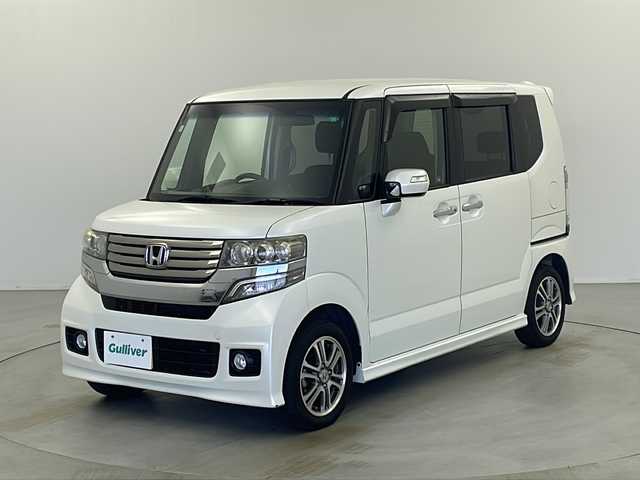 ホンダ Ｎ ＢＯＸ カスタム G Lパッケージ 栃木県 2013(平25)年 16.1万km プレミアムホワイトパール 社外SDナビ/・AM/FM/CD/DVD/フルセグ/SD/BT/iPod/左側電動スライドドア/ETC/HIDヘッドランプ/純正マット/ドアバイザー/社外14インチアルミ付きスタッドレス積み込み/保証書/取扱説明書
