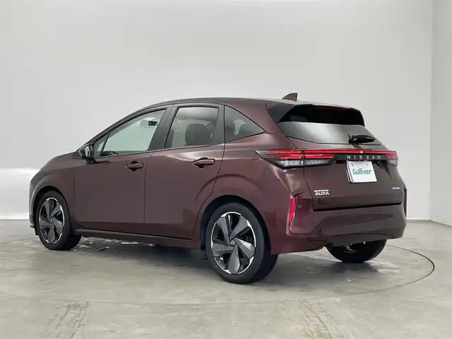 日産 オーラ G レザーエディション 埼玉県 2022(令4)年 1.9万km バーガンディー プロパイロット　ＢＯＳＥサウンド　純正９インチディスプレイオーディオ　アラウンドビュー　ＢＳＩ　ＥＴＣ２．０　前後ドラレコ　レーダークルーズ　インテリジェントルームミラー　ワイヤレス充電　ＨＤＭＩ