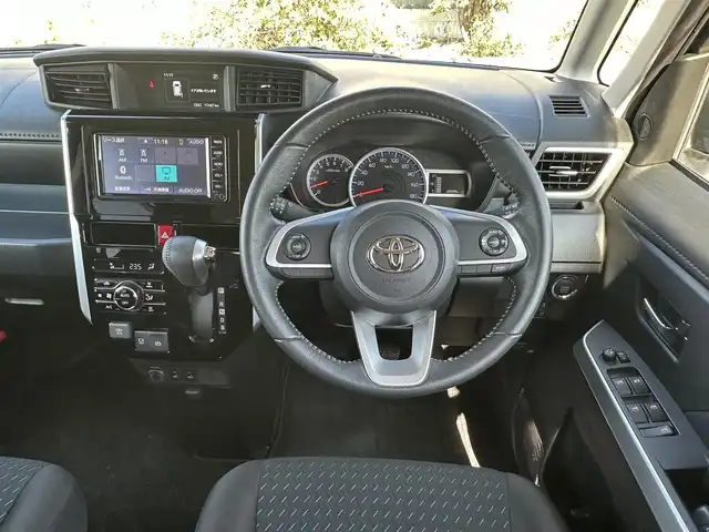 トヨタ ルーミー カスタムG－T 東京都 2021(令3)年 1.8万km 紺Ｍ ナビゲーション　/フルセグテレビ１　/ＣＤ　/ＡＵＸ接続　/ブルートゥース接続　/バックカメラ　/ETC/ドライブレコーダー/スマートキー/衝突軽減ブレーキ　/車線逸脱警報　/アイドリングストップ　/両側パワースライドドア　/シートヒーター　/保証書　/取扱説明書/整備手帳