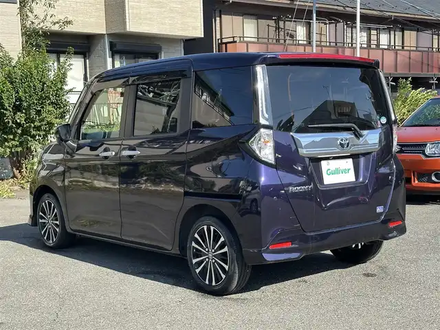 トヨタ ルーミー カスタムG－T 東京都 2021(令3)年 1.8万km 紺Ｍ ナビゲーション　/フルセグテレビ１　/ＣＤ　/ＡＵＸ接続　/ブルートゥース接続　/バックカメラ　/ETC/ドライブレコーダー/スマートキー/衝突軽減ブレーキ　/車線逸脱警報　/アイドリングストップ　/両側パワースライドドア　/シートヒーター　/保証書　/取扱説明書/整備手帳