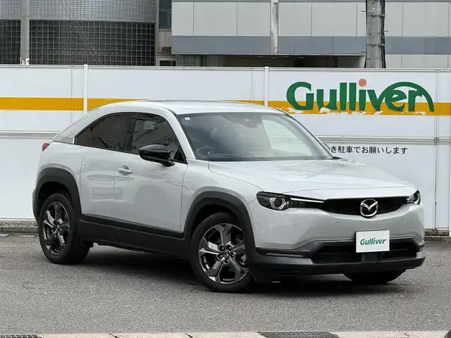 マツダ ＭＸ－３０ 愛知県 2021(令3)年 3.2万km セラミックM /純正メモリナビ//FM/AM/BT/USB/HDMI/フルセグ//360°ビューモニター//ビルトインETC//前後ドライブレコーダー//ベーシックパッケージ//本革巻きステアリング//交通標識認識システム//ヒーテッドドアミラー//ステアリングベゼル//ステアリングスイッチ//リアパッケージトレイ//アドバンストキーレスエントリーシステム//エクステリアパッケージ//ピラーガーニッシュ//インテリアパッケージ//360°セーフティパッケージ//ドライバーモニタリング//ユーティリティパッケージ//ステアリングヒーター//前席シートヒーター//運転席10wayパワーシート＆シートメモリ//セーフティパッケージ//アダプティブLEDライト//シグネチャーLEDランプ//デイタイムランニングライト//クルージング＆トラフィック・サポート//スマートブレーキサポート//茶革ハーフレザーシート//HUD/BSM/TCS/ACC//コーナーセンサー//レーンキープアシスト//ディスタンススピードアラート//前側方接近車両検知//後側方接近車両検知//車線逸脱警報//純正ドアバイザー//社外フロアマット//ISOFIX//保証書//取扱説明書//ナビ取扱説明書//ドラレコ取扱説明書//スマートスペアキー//D記録簿R3~R6