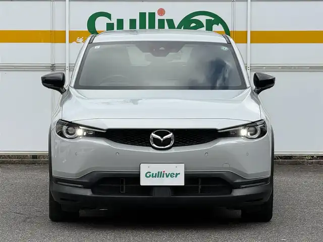 マツダ ＭＸ－３０ 愛知県 2021(令3)年 3.2万km セラミックM /純正メモリナビ//FM/AM/BT/USB/HDMI/フルセグ//360°ビューモニター//ビルトインETC//前後ドライブレコーダー//ベーシックパッケージ//本革巻きステアリング//交通標識認識システム//ヒーテッドドアミラー//ステアリングベゼル//ステアリングスイッチ//リアパッケージトレイ//アドバンストキーレスエントリーシステム//エクステリアパッケージ//ピラーガーニッシュ//インテリアパッケージ//360°セーフティパッケージ//ドライバーモニタリング//ユーティリティパッケージ//ステアリングヒーター//前席シートヒーター//運転席10wayパワーシート＆シートメモリ//セーフティパッケージ//アダプティブLEDライト//シグネチャーLEDランプ//デイタイムランニングライト//クルージング＆トラフィック・サポート//スマートブレーキサポート//茶革ハーフレザーシート//HUD/BSM/TCS/ACC//コーナーセンサー//レーンキープアシスト//ディスタンススピードアラート//前側方接近車両検知//後側方接近車両検知//車線逸脱警報//純正ドアバイザー//社外フロアマット//ISOFIX//保証書//取扱説明書//ナビ取扱説明書//ドラレコ取扱説明書//スマートスペアキー//D記録簿R3~R6