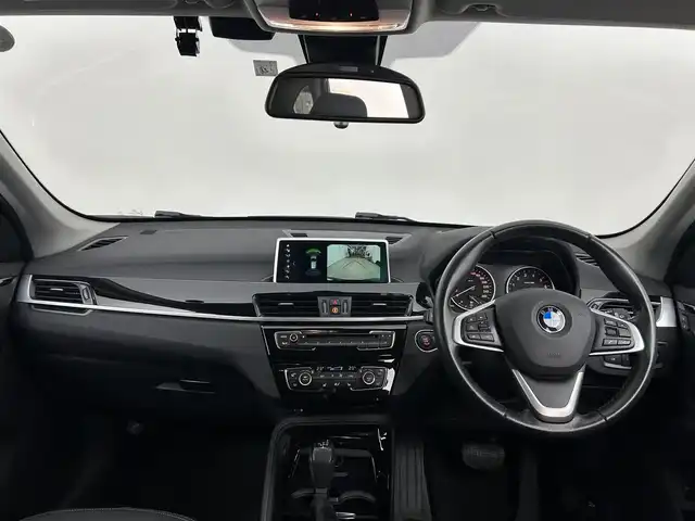 ＢＭＷ Ｘ１ 道央・札幌 2018(平30)年 4.3万km ジェットブラック ・４WD/・純正メモリナビ/・CD/DVD/BT/USB/・バックカメラ/・ETC（ルームミラー一体型）/・クリアランスソナー/・アクティブクルーズコントロール/・アイドリングストップ/・横滑り防止装置/・ステアリングスイッチ/・ハーフレザーシート/・D＋N席シートヒーター/・パワーバックドア/・ルーフレール/・LEDヘッドライト/・フォグランプ/・プッシュスタート/・スマートキー/・純正フロアマット/・純正17インチAW/・純正18インチAW＋夏タイヤ積込（溝７mm）/・取扱説明書