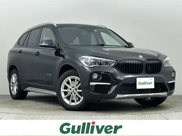 ＢＭＷ Ｘ１ 道央・札幌 2018(平30)年 4.3万km ジェットブラック ・４WD/・純正メモリナビ/・CD/DVD/BT/USB/・バックカメラ/・ETC（ルームミラー一体型）/・クリアランスソナー/・アクティブクルーズコントロール/・アイドリングストップ/・横滑り防止装置/・ステアリングスイッチ/・ハーフレザーシート/・D＋N席シートヒーター/・パワーバックドア/・ルーフレール/・LEDヘッドライト/・フォグランプ/・プッシュスタート/・スマートキー/・純正フロアマット/・純正17インチAW/・純正18インチAW＋夏タイヤ積込（溝７mm）/・取扱説明書