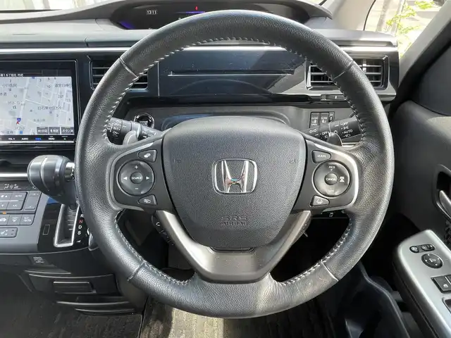ホンダ ステップワゴン スパーダクールスピリット HセンシングBスタイル 道央・札幌 2019(平31)年 1.9万km プラチナホワイトパール ・４WD/・ホンダセンシング/・ワンオーナー/・寒冷地仕様/・純正ナビ/　CD＆DVD＆BT＆TV/・バックカメラ/・ハーフレザーシート/・両側パワースライドドア/・レーンキープアシスト/・レーダークルーズコントロール/・アイドリングストップ/・シートヒーター/・オートエアコン/・オートライト/・プッシュスタート/・スマートキー/・純正エンジンスターター/・ビルトインETC/・パドルシフト/・ミラーヒーター/・電動格納ミラー/・ワイパー熱線/・純正AW＆冬タイヤ積込/・わくわくゲート/・純正フロアマット/・ドアバイザー/・ウィンカーミラー/・フォグライト/・LEDヘッドライト/・スペアキー