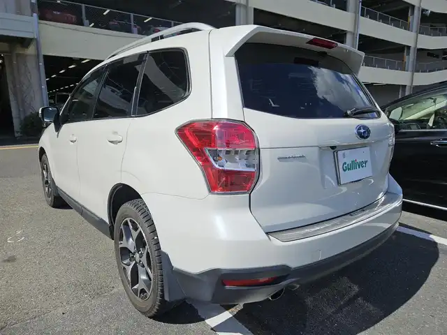スバル フォレスター 2．0XT アイサイト 長崎県 2013(平25)年 2.7万km サテンホワイトパール 〇４WD/〇社外ナビ/〇フルセグTV/〇パワーバックドア/〇バックカメラ/〇ビルトインETC/〇ドライブレコーダー/〇全車速追従機能付レーダークルーズコントロール/〇アイサイトVer2/〇SRSエアバッグ/〇ターボ/〇左右独立温度調整オートエアコン/〇革巻きステアリングホイール/〇パドルシフト/〇合皮コンビシート/〇パワーシート/シートヒーター/〇純正18インチアルミホイール/〇ルーフレール/〇キーレスアクセス/プッシュスタート/〇禁煙車