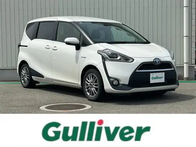 トヨタ シエンタ ハイブリッド G 富山県 2015(平27)年 1.9万km ホワイトパールクリスタルシャイン ワンオーナー/CDオーディオ/衝突軽減ブレーキ/オートマチックハイビーム/レーンディパーチャーアラート/両側パワースライドドア/運転席助手席シートヒーター/LEDオートライト/スマートキー/プッシュスタートエンジン/ホイール付き夏タイヤ4本積込