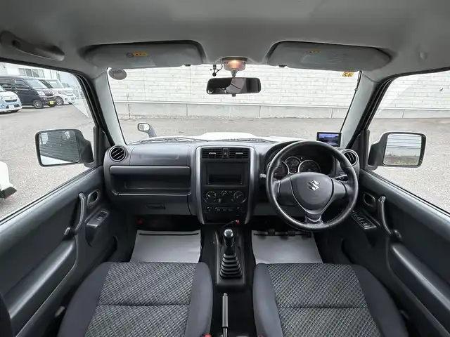 スズキ ジムニー XG 山形県 2014(平26)年 4.5万km スペリアホワイト ４WD/ターボ/フロントカメラ/横滑り防止装置/リフトアップ/社外足廻り/社外FRバンパー/社外マフラー/社外アルミホイール/背面タイヤ/フォグランプ/スペアキー/保証書