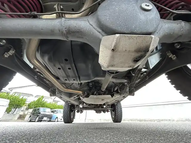 スズキ ジムニー XG 山形県 2014(平26)年 4.5万km スペリアホワイト ４WD/ターボ/フロントカメラ/横滑り防止装置/リフトアップ/社外足廻り/社外FRバンパー/社外マフラー/社外アルミホイール/背面タイヤ/フォグランプ/スペアキー/保証書
