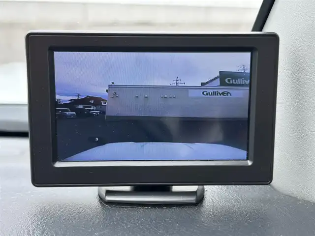 スズキ ジムニー XG 山形県 2014(平26)年 4.5万km スペリアホワイト ４WD/ターボ/フロントカメラ/横滑り防止装置/リフトアップ/社外足廻り/社外FRバンパー/社外マフラー/社外アルミホイール/背面タイヤ/フォグランプ/スペアキー/保証書