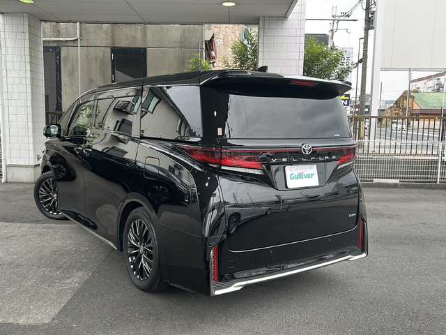 トヨタ ヴェルファイア ハイブリット Z プレミア 京都府 2023(令5)年 2.5万km ブラック 純正14インチナビ/Bluetooth/フルセグTV/パノラミックビューモニター/バックカメラ/両側パワースライドドア/ガラスルーフ/クルーズコントロール/アドバンストパーク/アドバンストドライブ/ビルトインETC2.0/パワーバックドア/メモリーパワーシート/シートヒーター/エアシート/禁煙/プリクラッシュセーフティ/前後コーナーセンサー/レーンキープアシスト/BSM/オートライト/オートマチックハイビーム/3列シート/ユニバーサルステップ/純正19インチAW/電動パーキングブレーキ/プッシュスタート/ステアリングスイッチ/パドルシフト/純正ドアバイザー/純正フロアマット/保証書/スマートキースペア